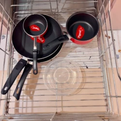 kitchen trolley having frying pans in service apartment