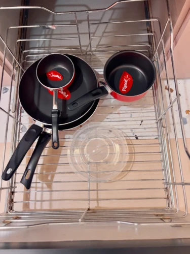 kitchen trolley having frying pans in service apartment