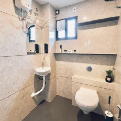 modern bathroom with all facilities in the service apartment