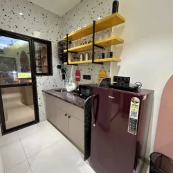 self checkin studio apartment with cozy sofa, TV unit, dining space, and modern interior