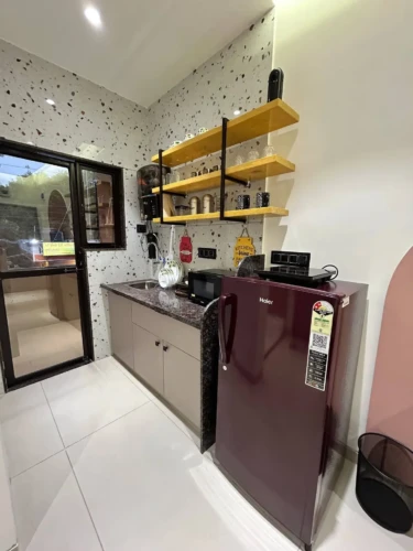 self checkin studio apartment with cozy sofa, TV unit, dining space, and modern interior