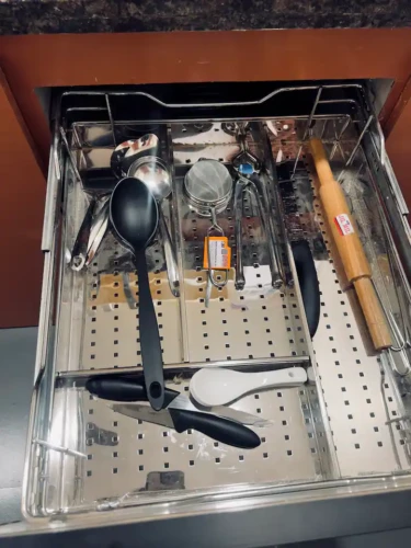 kitchen trolley with spoons and knives in stylish stay for professionals